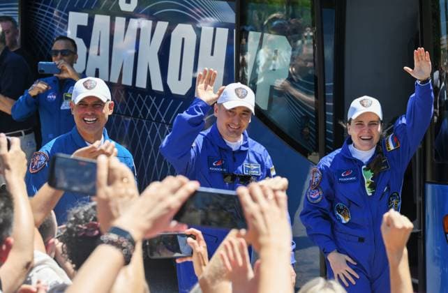 Kazakhstan Russia Space 9205139 14.07.2026 Prime crew members, NASA astronaut Anil Menon, Roscosmos cosmonauts Pyotr Dubrov and Anna Kikina leave their hotel for a pre-launch preparation ahead of the 75th expedition to the International Space Station (ISS) at the Baikonur Cosmodrome, in Baikonur, Kazakhstan. Yuri Kochetkov Sputnik Baikonur Kazakhstan  Copyright: xYurixKochetkovx