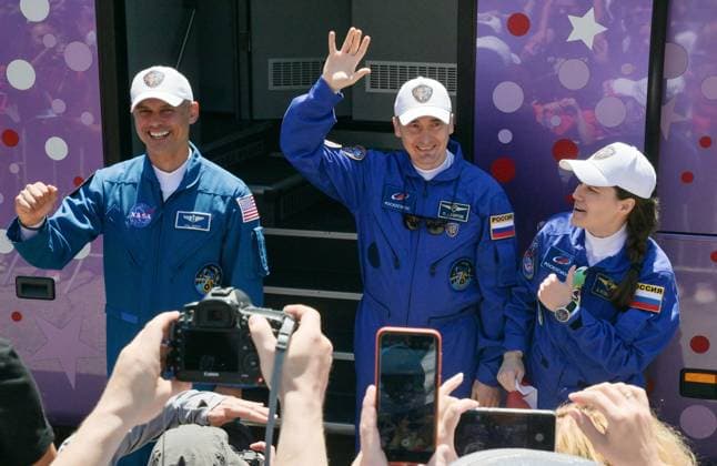Kazakhstan Russia Space 9205143 14.07.2026 Prime crew members, NASA astronaut Anil Menon, Roscosmos cosmonauts Pyotr Dubrov and Anna Kikina leave their hotel for a pre-launch preparation ahead of the 75th expedition to the International Space Station (ISS) at the Baikonur Cosmodrome, in Baikonur, Kazakhstan. Yuri Kochetkov Sputnik Baikonur Kazakhstan  Copyright: xYurixKochetkovx