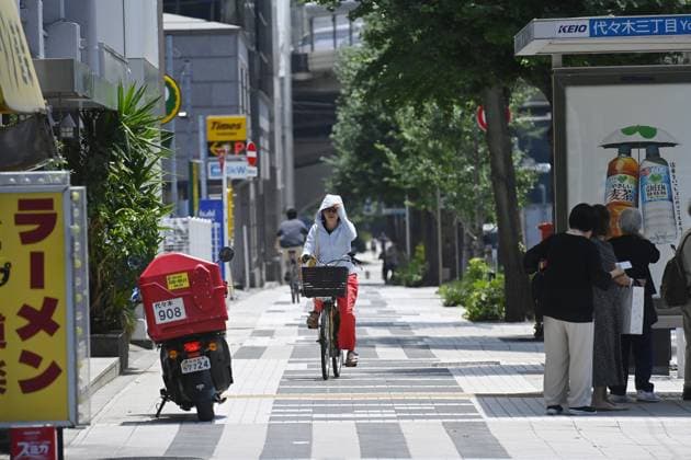 Extreme heat grips Tokyo as temperatures rise across eastern Japan TOKYO, JAPAN - JULY 14 : Pedestrians and cyclists travel along a street during hot weather in Tokyo, Japan, July 14, 2026. Authorities advised people to remain hydrated and take precautions against heatstroke as temperatures climbed across eastern Japan. David Mareuil Anadolu Tokyo Japan. Editorial use only. Please get in touch for any other usage.  Copyright: x2026xAnadoluxDavidxMareuilx