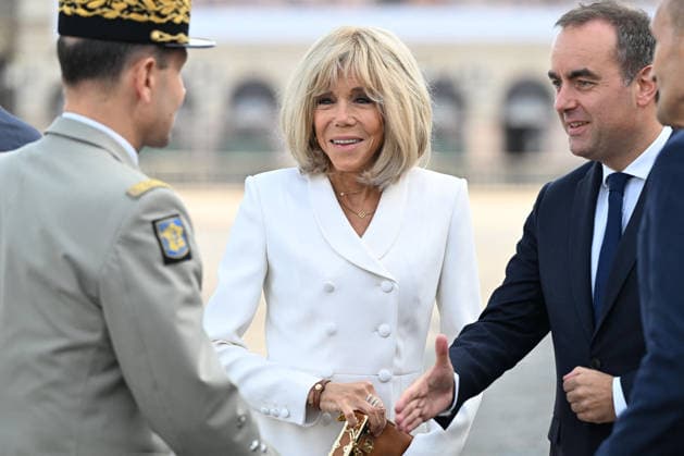 President Emmanuel Macron, Brigitte Macron, and officials at the July 14 military ceremony in Paris. Jeanne Accorsini, Pool Bestimage. French Prime Minister Sébastien Lecornu with French President Emmanuel Macron’s wife, Brigitte Macron, upon arrival for the annual Bastille Day military parade at the Place de la Concorde in Paris, France, on July 14, 2026 ACCORSINIJEANNE accorsini0015 Credit Jeanne Accorsini SIPA 2607141040 Paris, France  Copyright: xJeannexAccorsinix xPoolx xBestimagexJeannexAccorsinix xPoolx xBestimagex