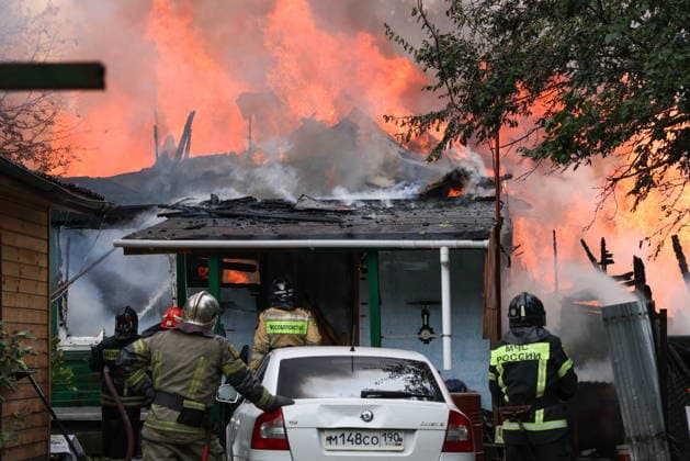 RUSSIA, MYTISHCHI - JULY 14, 2026: Firefighters put out a fire at a residential house. Georgy Chernyshov TASS  95024349