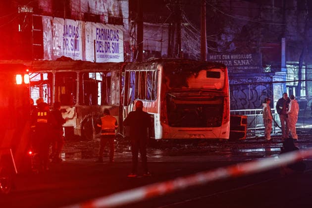 Santiago, July 14, 2026: A traffic accident involving a Red Eléctrico bus and a private vehicle at the corner of Santa Rosa and Franklin in the city of Santiago caused a fire in commercial establishments at that intersection. Diego Martin Aton Chile, Aton 1172285 jpeg  Copyright: DIEGOxMARTIN ATONxCHILE