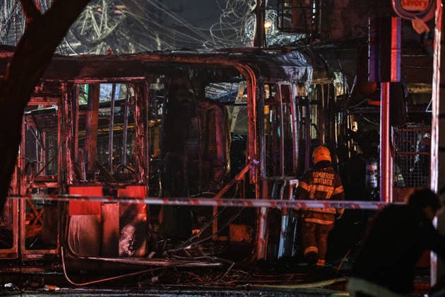 Santiago, July 14, 2026 A traffic accident involving a Red Eléctrico bus and a private vehicle at the corner of Santa Rosa and Franklin in the city of Santiago caused a fire in commercial establishments at that intersection. Diego Martin Aton Chile, Aton 1172288 jpeg  Copyright: DIEGOxMARTIN ATONxCHILE
