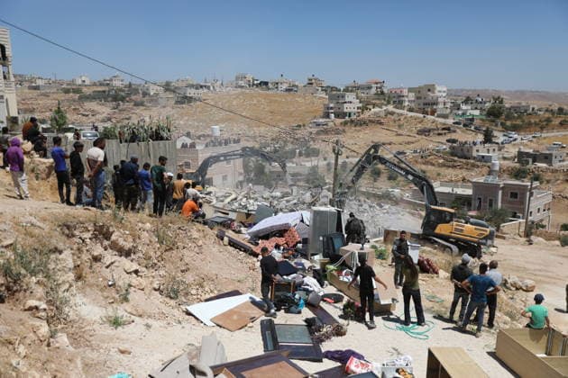 Israeli forces demolish Palestinian home in southern West Bank Israeli army vehicles demolish the home of Palestinian Osama Masaaf in the village of al-Deirat, east of Yatta, south of Hebron in the occupied West Bank, on July 14, 2026. Witnesses said the demolition took place during an Israeli military operation accompanied by heightened security measures. They added that Israeli forces used pepper spray to disperse Palestinians gathered at the scene, causing several people to sustain minor injuries. Photo by Mamoun Wazwaz apaimages Hebron West Bank Palestinian Territory 140726_Hebron_MW_00(28) Copyright: xapaimagesxMamounxWazwazx xapaimagesx