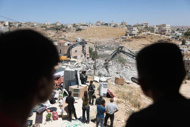 Israeli forces demolish Palestinian home in southern West Bank Israeli army vehicles demolish the home of Palestinian Osama Masaaf in the village of al-Deirat, east of Yatta, south of Hebron in the occupied West Bank, on July 14, 2026. Witnesses said the demolition took place during an Israeli military operation accompanied by heightened security measures. They added that Israeli forces used pepper spray to disperse Palestinians gathered at the scene, causing several people to sustain minor injuries. Photo by Mamoun Wazwaz apaimages Hebron West Bank Palestinian Territory 140726_Hebron_MW_00(29) Copyright: xapaimagesxMamounxWazwazx xapaimagesx