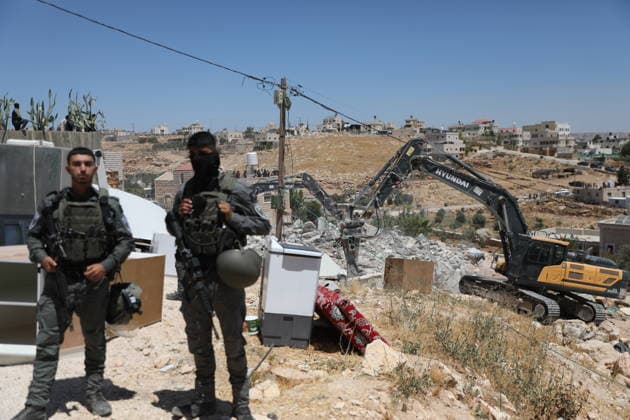 Israeli forces demolish Palestinian home in southern West Bank Israeli army vehicles demolish the home of Palestinian Osama Masaaf in the village of al-Deirat, east of Yatta, south of Hebron in the occupied West Bank, on July 14, 2026. Witnesses said the demolition took place during an Israeli military operation accompanied by heightened security measures. They added that Israeli forces used pepper spray to disperse Palestinians gathered at the scene, causing several people to sustain minor injuries. Photo by Mamoun Wazwaz apaimages Hebron West Bank Palestinian Territory 140726_Hebron_MW_00(31) Copyright: xapaimagesxMamounxWazwazx xapaimagesx