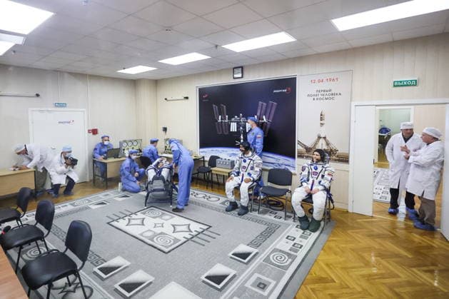KAZAKHSTAN, BAIKONUR - JULY 14, 2026: ISS Expedition 74 75 prime crew members Roscosmos cosmonaut Pyotr Dubrov, NASA astronaut Anil Menon and Roscosmos cosmonaut Anna Kikina (L-R) are seen during a spacesuit check before the launch of the Soyuz-2.1a rocket booster carrying the Soyuz MS-29 spacecraft from Baikonur Cosmodrome. Sergei Savostyanov TASS  95028888