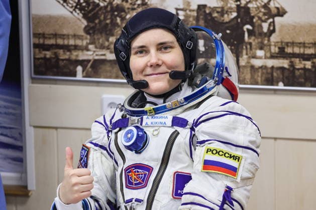 KAZAKHSTAN, BAIKONUR - JULY 14, 2026: ISS Expedition 74 75 prime crew member, Roscosmos cosmonaut Anna Kikina gives a thumbs up gesture during a spacesuit check before the launch of the Soyuz-2.1a rocket booster carrying the Soyuz MS-29 spacecraft from Baikonur Cosmodrome. Sergei Savostyanov TASS  95028825
