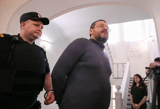 Russia Artpodgotovka Movement Trial 9205204 14.07.2026 A defendant in the case against members of the Artpodgotovka extremist organisation, which is banned in Russia, accused of plotting to blow up a train in Russia s Orenburg region, is escorted before a hearing at the Second Western District Military Court in Moscow, Russia. Evgeny Biyatov Sputnik Moscow Russia  Copyright: xEvgenyxBiyatovx