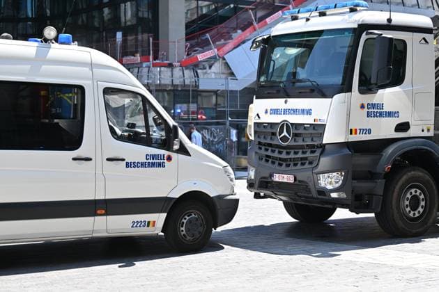 Civil protection pictured at the scene of a fire at the OXY building at place De Brouckere, in Brussels, Tuesday 14 July 2026s. The Brussels Labour Inspectorate confirms several bodies were found in the lift shafts, 6 people are still missing. The fire broke out on the second floor of the building that is currently being renovated.  EMILExWINDAL 181118362