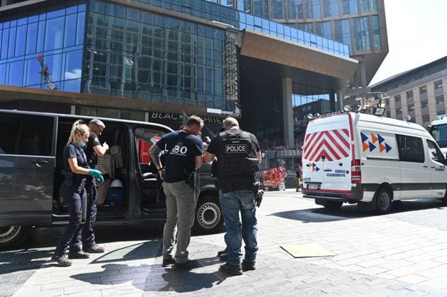 the scene of a fire at the OXY building at place De Brouckere, in Brussels, Tuesday 14 July 2026s. The Brussels Labour Inspectorate confirms several bodies were found in the lift shafts, 6 people are still missing. The fire broke out on the second floor of the building that is currently being renovated.  EMILExWINDAL 181122146
