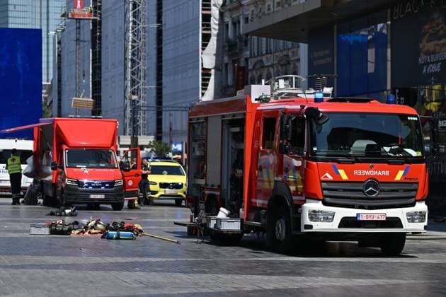 the scene of a fire at the OXY building at place De Brouckere, in Brussels, Tuesday 14 July 2026s. The Brussels Labour Inspectorate confirms several bodies were found in the lift shafts, 6 people are still missing. The fire broke out on the second floor of the building that is currently being renovated.  EMILExWINDAL 181122285