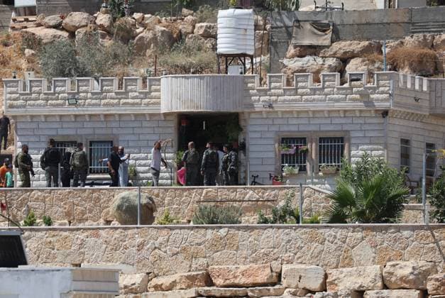 Israeli Forces Demolish Palestinian Home South of Hebron AL-DEIRAT, WEST BANK JULY 14, 2026: Israeli forces demolished the home of Palestinian resident Osama Masaaf in the village of Al-Deirat, south of Hebron, in the occupied West Bank, on July 14, 2026, displacing a family of eight. Israeli authorities said the house was demolished for being built without an Israeli-issued permit. Hebron Palestine, State of Copyright: x xMosabxshawerx xJNAxPressx