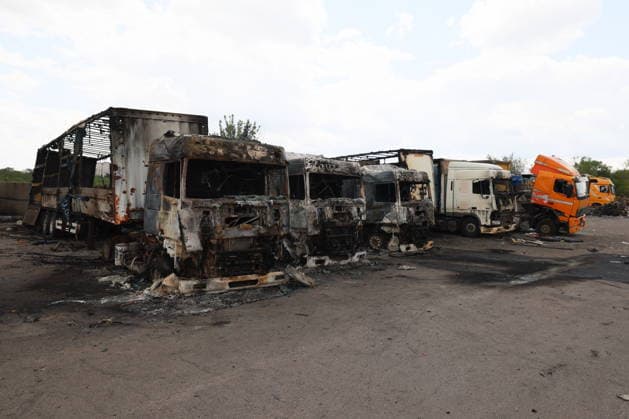 RUSSIA, LUGANSK - JULY 14, 2026: Destroyed vehicles are seen after a military strike on a parking lot with civilian trucks. Alexander Reka TASS  95028626
