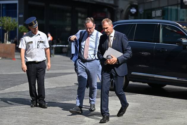Prime Minister Bart de Wever and pictured at the scene of a fire at the OXY building at place De Brouckere, in Brussels, Tuesday 14 July 2026s. The Brussels Labour Inspectorate confirms several bodies were found in the lift shafts, 6 people are still missing. The fire broke out on the second floor of the building that is currently being renovated.  EMILExWINDAL 181129473