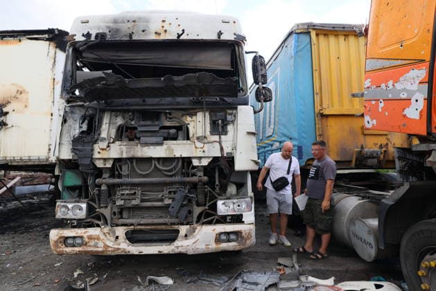 RUSSIA, LUGANSK - JULY 14, 2026: Destroyed vehicles are seen after a military strike on a parking lot with civilian trucks Lugansk Russia  - ZUMAt113 20260714_zaa_t113_240 Copyright: xAlexanderxRekax