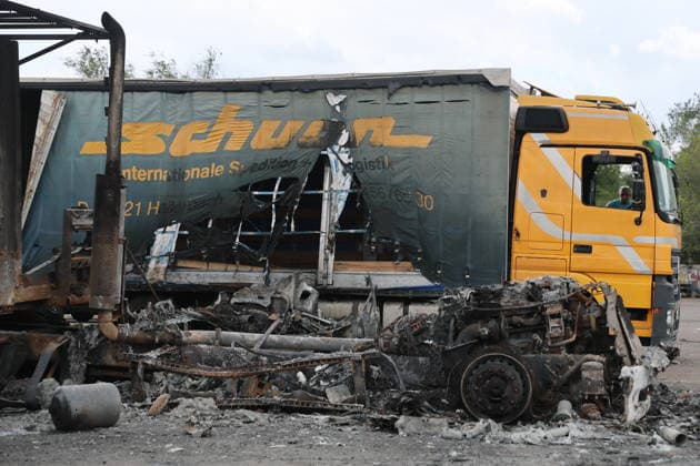 RUSSIA, LUGANSK - JULY 14, 2026: A destroyed vehicle is seen after a military strike on a parking lot with civilian trucks Lugansk Russia  - ZUMAt113 20260714_zaa_t113_247 Copyright: xAlexanderxRekax