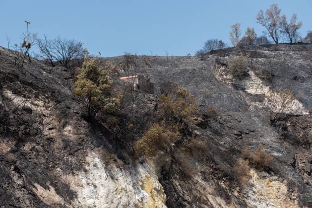 Fire breaks out on Solfatara volcano in Pozzuoli POZZUOLI, ITALY - JULY 14: The aftermath of a wildfire is seen in the Pisciarelli area on the outer edge of the Solfatara volcanic crater in the Campi Flegrei (Phlegraean Fields) volcanic region near Naples, Italy, on July 14, 2026. The fire, which broke out on July 13, burned vegetation across the area as firefighters continued assessment and recovery operations. Eliano Imperato Anadolu Naples Italy. Editorial use only. Please get in touch for any other usage.  Copyright: x2026xAnadoluxElianoxImperatox