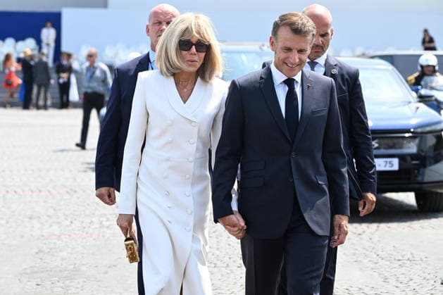 President Emmanuel Macron, his wife Brigitte Macron, and officials at the July 14, 2026, military ceremony. Jeanne Accorsini, Pool Bestimage. France’s President Emmanuel Macron and his wife Brigitte Macron leave at the end of the annual Bastille Day military parade on the Place de la Concorde in Paris, France, July 14, 2026 ACCORSINIJEANNE accorsini0499 Credit Jeanne Accorsini SIPA 2607141454 Paris, France  Copyright: xJeannexAccorsinix xPoolx xBestimagexJeannexAccorsinix xPoolx xBestimagex