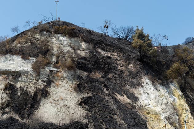 Fire breaks out on Solfatara volcano in Pozzuoli POZZUOLI, ITALY - JULY 14: The aftermath of a wildfire is seen in the Pisciarelli area on the outer edge of the Solfatara volcanic crater in the Campi Flegrei (Phlegraean Fields) volcanic region near Naples, Italy, on July 14, 2026. The fire, which broke out on July 13, burned vegetation across the area as firefighters continued assessment and recovery operations. Eliano Imperato Anadolu Naples Italy. Editorial use only. Please get in touch for any other usage.  Copyright: x2026xAnadoluxElianoxImperatox
