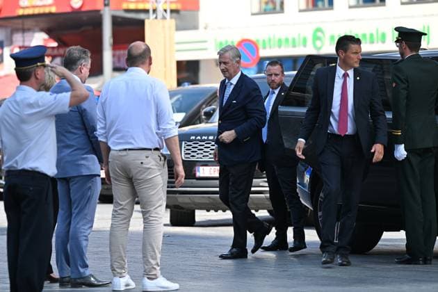 Prime Minister Bart de Wever, Bruxelles-Brussel mayor Philippe Close and King Philippe - Filip of Belgium pictured at the scene of a fire at the OXY building at place De Brouckere, in Brussels, Tuesday 14 July 2026s. The Brussels Labour Inspectorate confirms several bodies were found in the lift shafts, 6 people are still missing. The fire broke out on the second floor of the building that is currently being renovated.  EMILExWINDAL 181130251