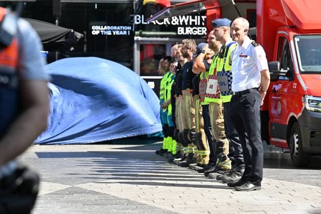 the scene of a fire at the OXY building at place De Brouckere, in Brussels, Tuesday 14 July 2026s. The Brussels Labour Inspectorate confirms several bodies were found in the lift shafts, 6 people are still missing. The fire broke out on the second floor of the building that is currently being renovated.  EMILExWINDAL 181130409