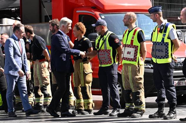 Visit of King Philippe : Fire in the OXY building on Place De Brouckère BRUSSELS, BELGIUM - JULY 14 : Visit of King Philippe : Fire in the OXY building on Place De Brouckère (several dead and missing) on July 14, 2026 in Brussels, Belgium, 14 07 2026 Brussels Belgium  Copyright: xDidierxLebrunx