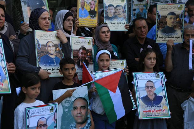 Palestinians rally in Nablus in solidarity with prisoners Palestinians take part in a solidarity demonstration in support of Palestinian prisoners in the West Bank city of Nablus on July 14, 2026. Participants waved Palestinian flags and carried placards calling for improved conditions for prisoners and the release of detainees amid continued tensions and protests related to the prisoners’ issue. Photo by Mohammed Nasser apaimages Nablus West Bank Palestinian Territory 140726_Nablus_MN_00(1) Copyright: xapaimagesxMohammedxNasserx xapaimagesx