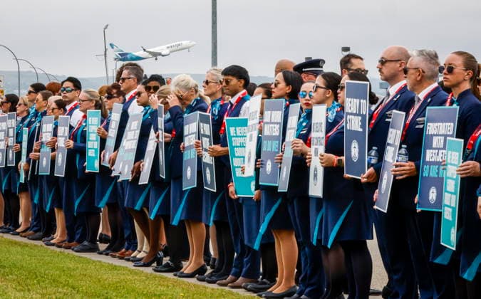 July 14, 2026, Calgary, Ab, CANADA: A WestJet plane takes off as WestJet flight attendants hold a Day of Action while union members vote on a possible strike in Calgary, Tuesday, July 14, 2026. Calgary CANADA  - ZUMAc35_ 20260714_zaf_c35_048 Copyright: xJeffxMcintoshx