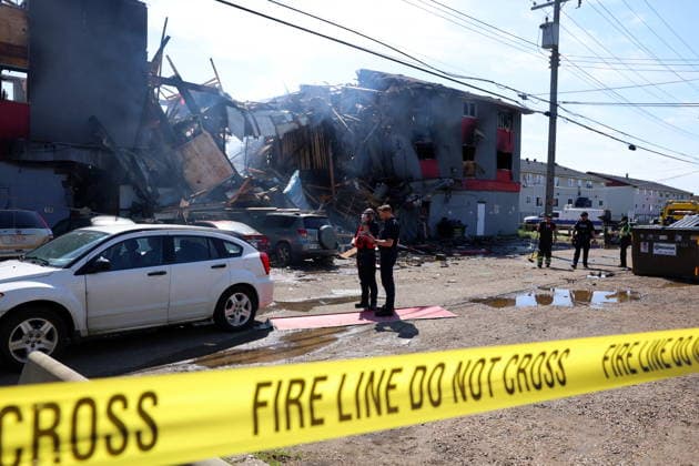 July 14, 2026, Edmonton, On, Canada: Edmonton police and fire investigators attend the scene of a structure fire at 132 Avenue and 82 Street in Edmonton, on Tuesday, July 14, 2026. Edmonton Canada  - ZUMAc35_ 20260714_zaf_c35_108 Copyright: xJamesxMaclennanx