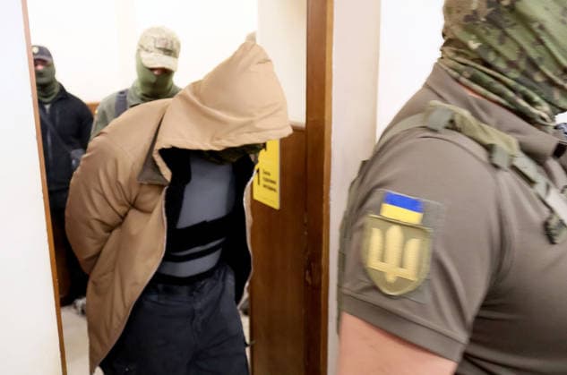 RECORD DATE NOT STATED Court officers escort 33-year-old Defence Intelligence of Ukraine (HUR) officer Vladyslav Reut, a suspect in the murder case of Anastasiia Berezovska, out of the courtroom after the Pecherskyi District Court in Kyiv ordered his pretrial detention for 60 days without the right to post bail, Kyiv, Ukraine, on July 9, 2026. Two people have been detained in connection with the murder investigation: former law enforcement officer Vitalii Zhykovych and serving HUR officer Vladyslav Reut. Thirty-nine-year-old Ukrainian citizen Anastasiia Berezovska had been placed on an international wanted list in connection with an alleged attempt to arrange the killing of the family of sanctioned businessman Vadym Yermolaiev in the Principality of Monaco (Photo  Copyright: xPavloxBahmutx