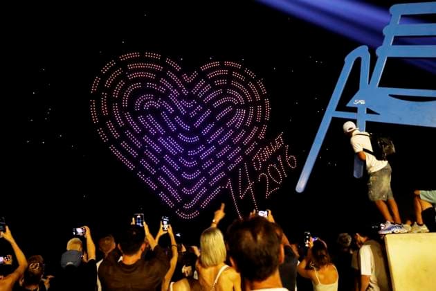 CEREMONY IN HONOR OF THE VICTIMS OF THE NICE ATTACKS PHOTOPQR NICE MATIN Dylan Meiffret Nice July 14, 2026 10 years after the July 14, 2016, Nice attack, a drone show and 86 beams of light illuminating the Promenade des Anglais Nice, July 14, 2026—10 years later—a ceremony paying tribute to the victims of the Nice attack on July 14, 2016 Nice, France  Copyright: xPHOTOPQR NICExMATIN MAXPPPxDylanxMeiffretx 20260714NIM8119 20260714NIM8119