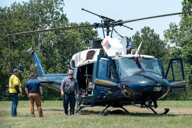 July 14, 2026, Washington, Dc, United States: Mechanics work on a helicopter from the US Air ForceÃ¢â‚¬â ¢s 1st Helicopter Squadron after it made a precautionary landing on an underground reservoir in Northwest Washington, D.C. on July 14, 2026. Washington United States - ZUMAl312 20260714_znp_l312_015 Copyright: xAndrewxLeydenx