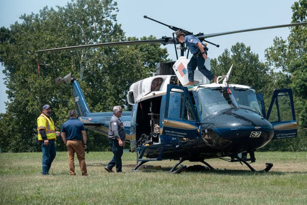 July 14, 2026, Washington, Dc, United States: Mechanics work on a helicopter from the US Air ForceÃ¢â‚¬â ¢s 1st Helicopter Squadron after it made a precautionary landing on an underground reservoir in Northwest Washington, D.C. on July 14, 2026. Washington United States - ZUMAl312 20260714_znp_l312_017 Copyright: xAndrewxLeydenx