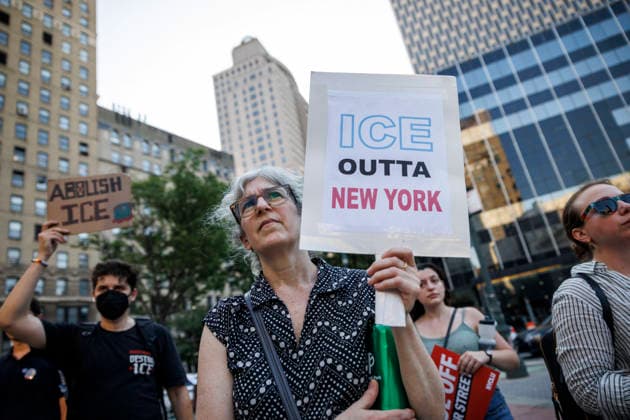 July 14, 2026, New York, New York, USA: A person is seen amongst rally-goers. Protesters gather and demand justice for Lorenzo Salgado Araujo, 52, a man shot and killed by Immigration and Customs Enforcement (ICE). Protesters call for a full investigation into the fatal shooting and demand an end to local collaboration with ICE. New York USA - ZUMAh182 20260714_znp_h182_003 Copyright: xMatthewxHoenx