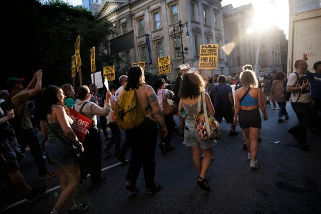 July 14, 2026, New York, New York, USA: Protesters march and demand justice for Lorenzo Salgado Araujo, 52, a man shot and killed by Immigration and Customs Enforcement (ICE). Protesters call for a full investigation into the fatal shooting and demand an end to local collaboration with ICE. New York USA  - ZUMAh182 20260714_znp_h182_006 Copyright: xMatthewxHoenx