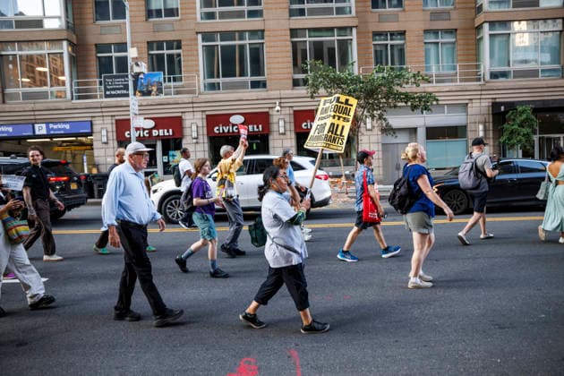 July 14, 2026, New York, New York, USA: Protesters march and demand justice for Lorenzo Salgado Araujo, 52, a man shot and killed by Immigration and Customs Enforcement (ICE). Protesters call for a full investigation into the fatal shooting and demand an end to local collaboration with ICE. New York USA  - ZUMAh182 20260714_znp_h182_009 Copyright: xMatthewxHoenx