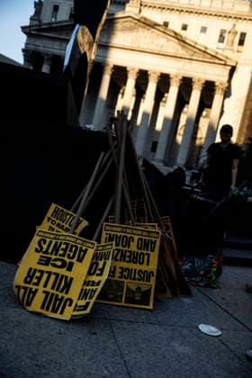 July 14, 2026, New York, New York, USA: Signs are seen during a protest. Protesters gather and demand justice for Lorenzo Salgado Araujo, 52, a man shot and killed by Immigration and Customs Enforcement (ICE). Protesters call for a full investigation into the fatal shooting and demand an end to local collaboration with ICE. New York USA - ZUMAh182 20260714_znp_h182_010 Copyright: xMatthewxHoenx