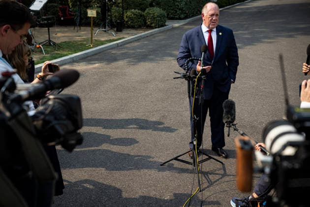 July 14, 2026, Washington, District Of Columbia, USA: White House Border Czar TOM HOMAN speaks to the media outside the West Wing of the White House in Washington. Homan confirmed that Immigration and Customs Enforcement (ICE) is implementing a short-term pause on most non-urgent vehicle stops following recent deadly shootings. Washington USA  - ZUMAs152 20260714_faa_s152_083 Copyright: xGraemexSloan POOLx