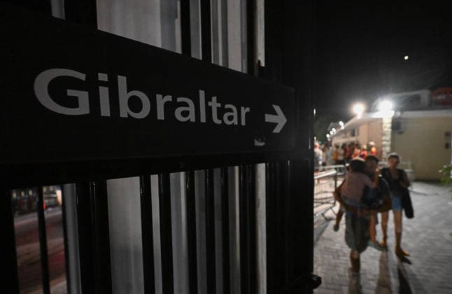 (260715) -- GIBRALTAR, July 15, 2026 -- People walk across the land border port between Gibraltar and Spain on July 15, 2026. The European Union (EU) and Britain on Tuesday formally signed an agreement in respect of Gibraltar in Brussels, removing routine checks at the land border between Gibraltar and Spain. Under the agreement, the movement of goods and workers between Gibraltar and Spain will be significantly facilitated, boosting economic links between Gibraltar and the EU. ) SPAIN-GIBRALTAR-LAND BORDER-ROUTINE CHECKS-REMOVING ChengxMin 