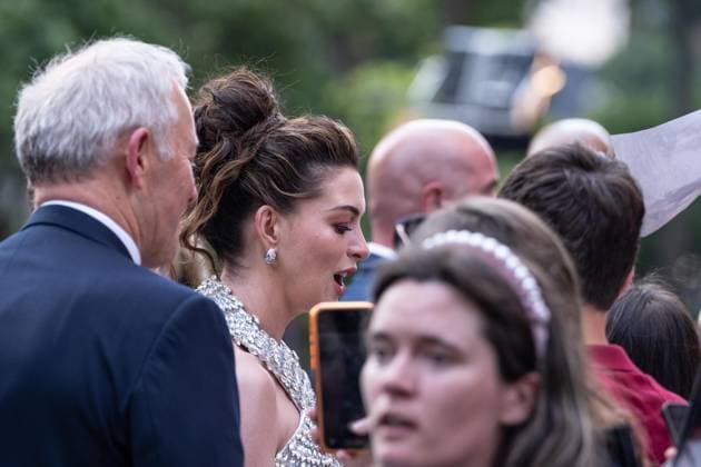 July 14, 2026, Bronx, New York, USA: Anne Hathaway greets fans as she attends premiere of The Odyssey at AMC Lincoln Square in New York, NY on July 14, 2026. Bronx USA  - ZUMAr339 20260714_znp_r339_051 Copyright: xLevxRadinx