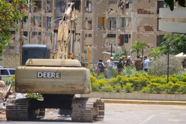 La Guaira Continues Controlled Demolition and Debris Removal After Earthquake PLAYA GRANDE, LA GUAIRA, VENEZUELA JULY 14, 2026: Excavators and civil carry out controlled demolition and debris removal operations in the coastal community of Playa Grande, one of the areas hardest hit by the earthquake that struck northern Venezuela 20 days earlier. The operations have entered the recovery phase, focusing on clearing major roads blocked by collapsed residential buildings to restore access and mobility for residents as reconstruction efforts continue. La Guaira Venezuela (Bolivarian Republic of) Copyright: x xMarioxFloresx xJNAxPressx