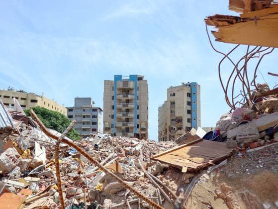 La Guaira Continues Controlled Demolition and Debris Removal After Earthquake PLAYA GRANDE, LA GUAIRA, VENEZUELA JULY 14, 2026: Excavators and civil carry out controlled demolition and debris removal operations in the coastal community of Playa Grande, one of the areas hardest hit by the earthquake that struck northern Venezuela 20 days earlier. The operations have entered the recovery phase, focusing on clearing major roads blocked by collapsed residential buildings to restore access and mobility for residents as reconstruction efforts continue. La Guaira Venezuela (Bolivarian Republic of) Copyright: x xMarioxFloresx xJNAxPressx
