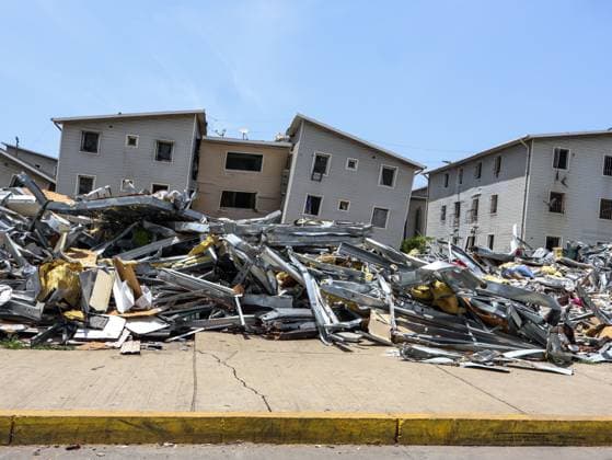 July 14, 2026, La Guaira, Venezuela (Bolivarian Republic of: PLAYA GRANDE, LA GUAIRA, VENEZUELA Ã¢â‚¬ JULY 14, 2026: Excavators and civil carry out controlled demolition and debris removal operations in the coastal community of Playa Grande, one of the areas hardest hit by the earthquake that struck northern Venezuela 20 days earlier. The operations have entered the recovery phase, focusing on clearing major roads blocked by collapsed residential buildings to restore access and mobility for residents as reconstruction efforts continue. JNA Press. La Guaira Venezuela (Bolivarian Republic of  - ZUMAq101 20260714_zna_q101_183 Copyright: xMarioxFloresx