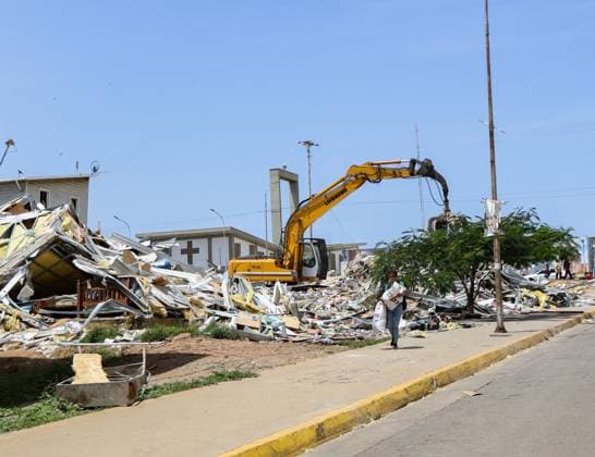 July 14, 2026, La Guaira, Venezuela (Bolivarian Republic of: PLAYA GRANDE, LA GUAIRA, VENEZUELA Ã¢â‚¬ JULY 14, 2026: Excavators and civil carry out controlled demolition and debris removal operations in the coastal community of Playa Grande, one of the areas hardest hit by the earthquake that struck northern Venezuela 20 days earlier. The operations have entered the recovery phase, focusing on clearing major roads blocked by collapsed residential buildings to restore access and mobility for residents as reconstruction efforts continue. JNA Press. La Guaira Venezuela (Bolivarian Republic of - ZUMAq101 20260714_zna_q101_186 Copyright: xMarioxFloresx
