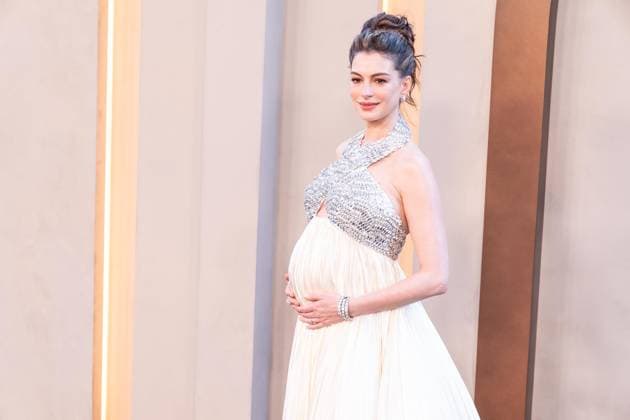 July 14, 2026, Bronx, New York, USA: Anne Hathaway wearing dress by Prada attends premiere of The Odyssey at AMC Lincoln Square in New York, NY on July 14, 2026. Bronx USA  - ZUMAr339 20260714_znp_r339_160 Copyright: xLevxRadinx