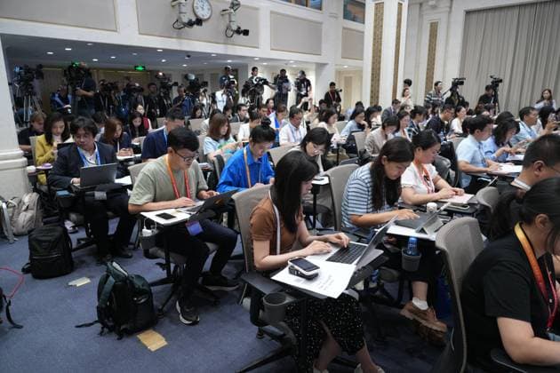 BEIJING, CHINA - JULY 15: Journalists work at a press conference held by the State Council Information Office (SCIO) on China s economic performance in H1 2026 on July 15, 2026 in Beijing, China.  Copyright: xVCGx 111654402366