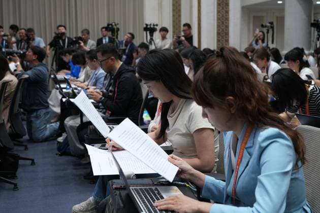 BEIJING, CHINA - JULY 15: Journalists work at a press conference held by the State Council Information Office (SCIO) on China s economic performance in H1 2026 on July 15, 2026 in Beijing, China.  Copyright: xVCGx 111654402424