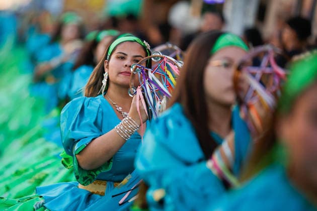July 14, 2026, La Tirana, Chile: A woman performs a dance carrying a tampon. In the town of La Tirana, located 78 km from the city of Iquique, in northern Chile, the traditional and massive religious festival for La Virgen del Carmen del Tamarugal was held. Where approximately 500 thousand pilgrims arrived to enjoy this religious festival, where thousands of faithful danced to the chinita with their colorful costumes. This tradition in the town of La Tirana makes it the most popular religious festival in Chile, where this year 100 years are commemorated since the Church crowned the Virgen del Carmen as patron saint of Chile. La Tirana Chile  - ZUMAs197 20260714_aaa_s197_150 Copyright: xSebastianxNancox