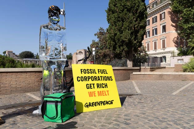 IPA86699889 - Ice Workers flash mob organized by Greenpeace Italy activists near the Colosseum in Rome to mark the European Day for Victims of the Global Climate Crisis  Copyright: xMatteoxNardonex xx 86699889